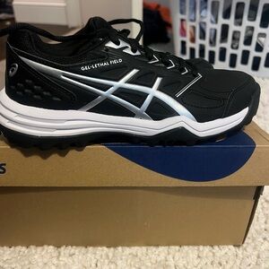 black and white asics turf shoes